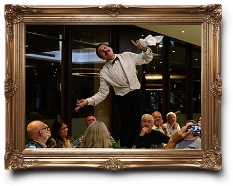 Waiter throwing napkins in the hotel dining room